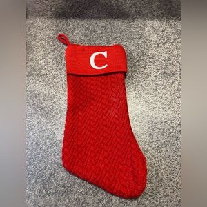 Large “C” Knit monogram Christmas stocking in red.